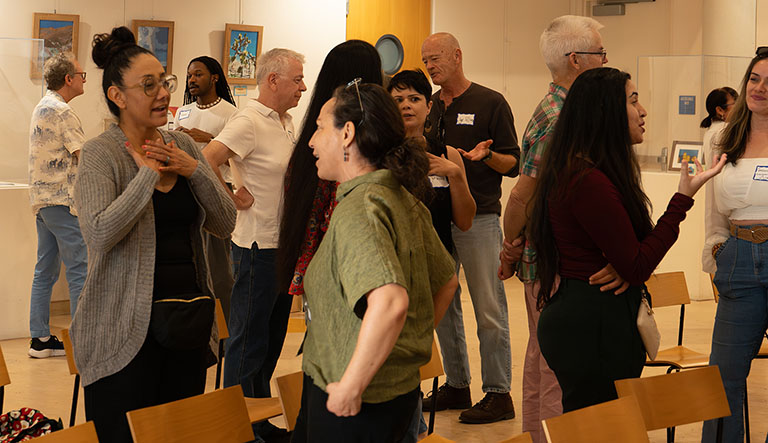 Artists Gathering in a Gallery